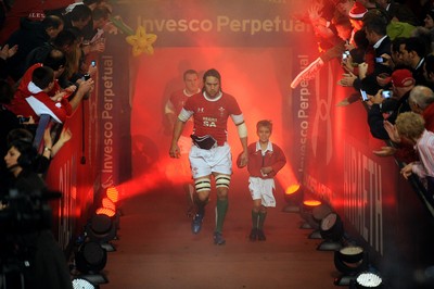 21.11.09 - Wales v Argentina - Invesco Perpetual Series 2009 - Wales captain Ryan Jones leads his team out with mascot Jonathan Hansford. 