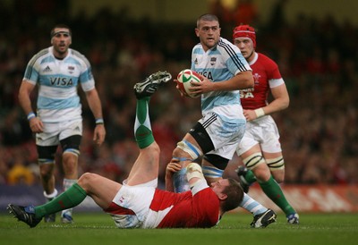 21.11.09 - Wales v Argentina... Wales' Gethin Jenkins tackles Argentina's Tomas Leonardi. 