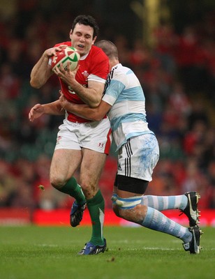 21.11.09... Wales v Argentina, Invesco Perpetual Series 2009 -  Wales' Stephen Jones is tackled by Argentina's Alejandro Abadie 
