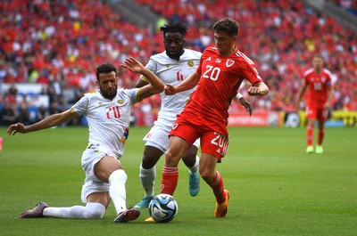 160623 - Wales v Armenia - UEFA European Championship Qualifers - Daniel James of Wales is challenegd by Ugochukwu Iwu and Artak Dashyan of Armenia