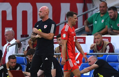 160623 - Wales v Armenia - UEFA European Championship Qualifers - Aaron Ramsey of Wales walks past Wales manager Rob Page after being substituted