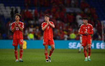 160623 - Wales v Armenia - UEFA European Championship Qualifers - Ethan Ampadu, David Brooks snd Neco Williams of Wales looks dejected