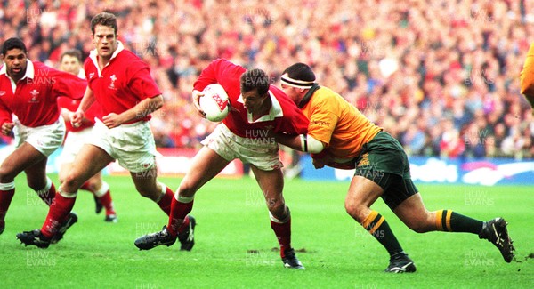 011296 - Wales v Australia -  Rob Howley of Wales tries to make headway