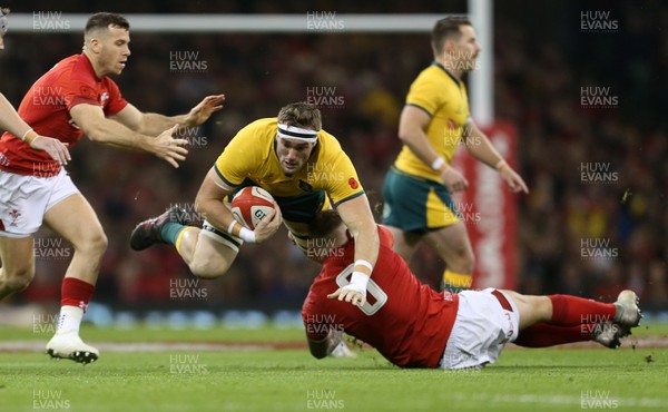 101118 - Wales v Australia - Under Armour Series 2018 - Izack Rodda of Australia is tackled by Ross Moriarty of Wales