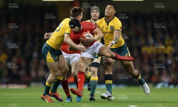 101118 - Wales v Australia - Under Armour Series 2018 - Leigh Halfpenny of Wales is tackled by Dane Haylett-Petty and Israel Folau of Australia
