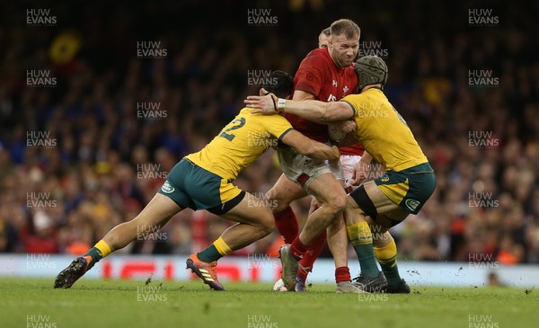 101118 - Wales v Australia - Under Armour Series 2018 - Ross Moriarty of Wales is tackled by Kurtley Beale and David Pocock of Australia