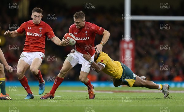 101118 - Wales v Australia - Under Armour Series 2018 - Gareth Anscombe of Wales is tackled by Sefa Naivalu of Australia