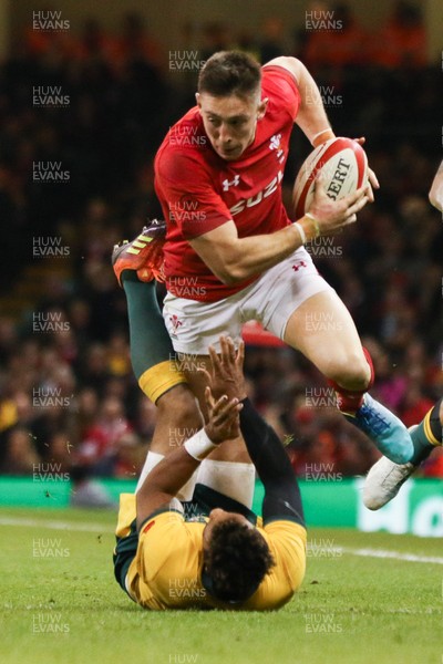 101118 - Wales v Australia, Under Armour Series 2018 - Josh Adams of Wales charges through Will Genia of Australia