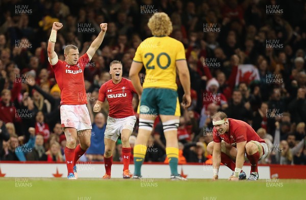 101118 - Wales v Australia, Under Armour Series 2018 - Hadleigh Parkes of Wales, Gareth Anscombe of Wales and Alun Wyn Jones of Wales celebrate on the final whistle as Ned Hanigan of Australia looks on