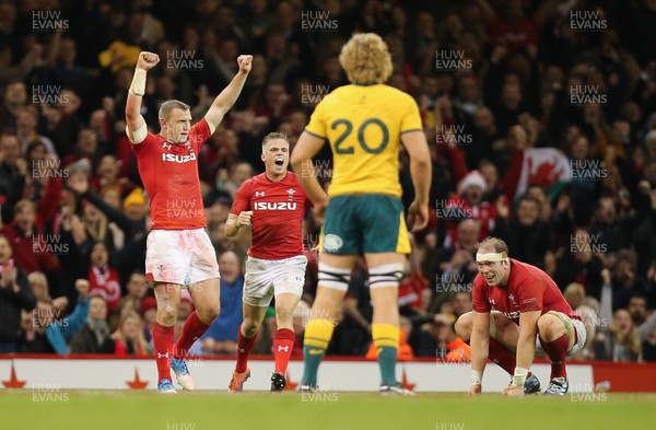 101118 - Wales v Australia, Under Armour Series 2018 - Hadleigh Parkes of Wales, Gareth Anscombe of Wales and Alun Wyn Jones of Wales celebrate on the final whistle as Ned Hanigan of Australia looks on