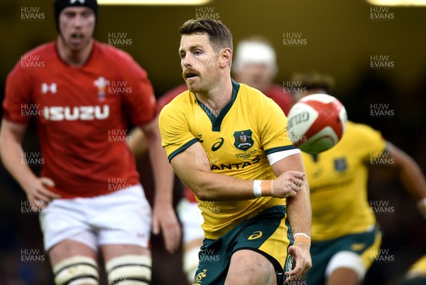 101118 - Wales v Australia - Under Armour Series -  Bernard Foley of Australia passes the ball away
