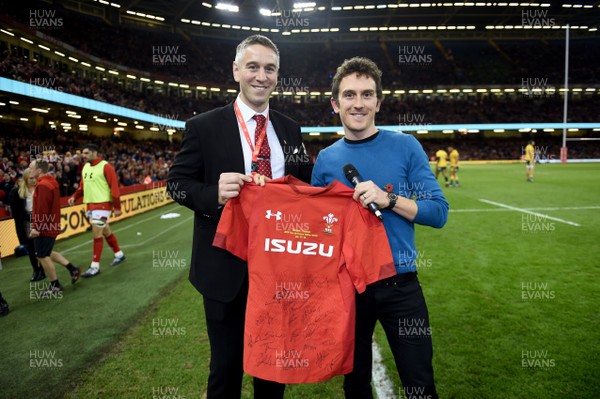 101118 - Wales v Australia - Under Armour Series -  Geraint Thomas is presented with a signed jersey by Ryan Jones of the WRU