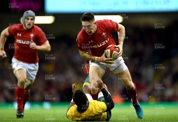 101118 - Wales v Australia - Under Armour Series -  Josh Adams of Wales is tackled by Will Genia of Australia