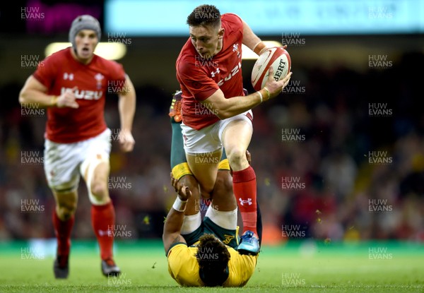 101118 - Wales v Australia - Under Armour Series -  Josh Adams of Wales is tackled by Will Genia of Australia