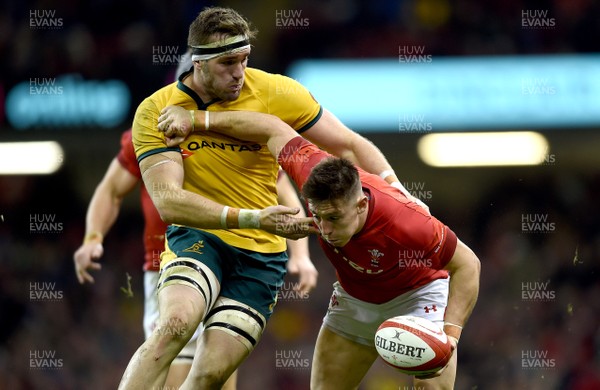 101118 - Wales v Australia - Under Armour Series -  Josh Adams of Wales is tackled by Adam Coleman of Australia