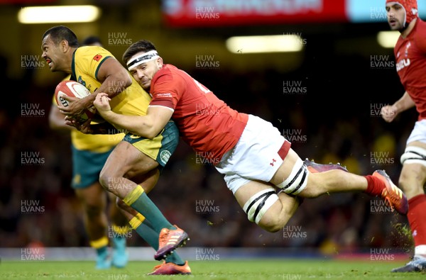 101118 - Wales v Australia - Under Armour Series -  Kurtley Beale of Australia is tackled by Ellis Jenkins of Wales