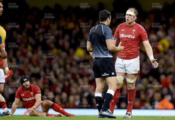 101118 - Wales v Australia - Under Armour Series -  Alun Wyn Jones of Wales talks to referee Ben O’Keeffe as Leigh Halfpenny of Wales lies in the background