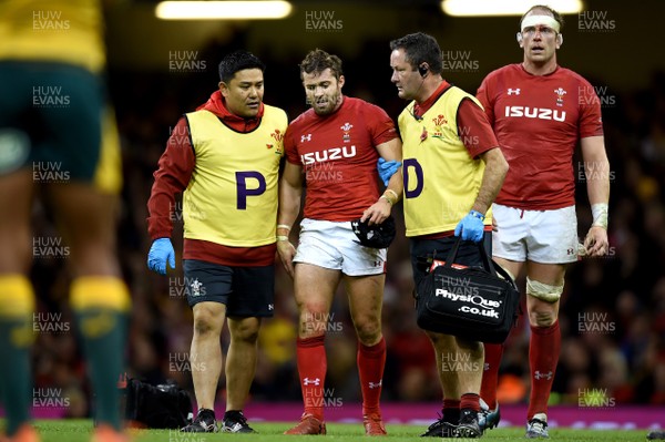 101118 - Wales v Australia - Under Armour Series -  Leigh Halfpenny of Wales goes off for a head injury assessment