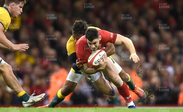 101118 - Wales v Australia - Under Armour Series - Tomos Williams of Wales is tackled by Will Genia of Australia
