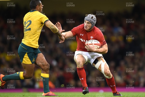 101118 - Wales v Australia - Under Armour Series - Jonathan Davies of Wales is tackled by Kurtley Beale of Australia