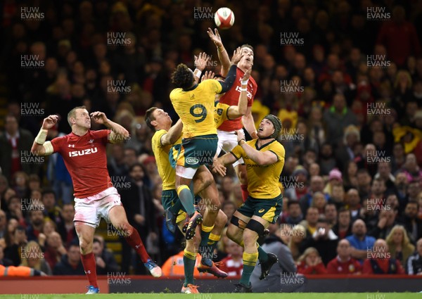 101118 - Wales v Australia - Under Armour Series - Will Genia of Australia and Liam Williams of Wales compete for highball 