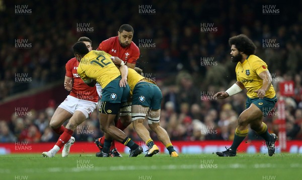111117 - Wales v Australia - Under Armour Series 2017 - Taulupe Faletau of Wales is tackled by Samu Kerevi and Ned Hanigan of Australia