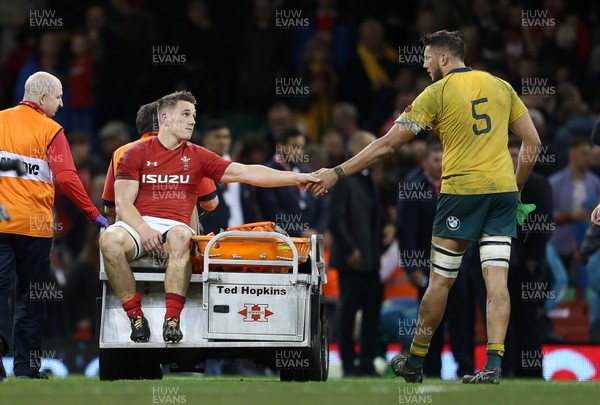 111117 - Wales v Australia - Under Armour Series 2017 - Dejected Jonathan Davies of Wales going off injured at full time shakes Adam Coleman of Australia hand