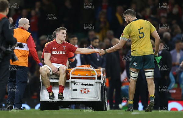 111117 - Wales v Australia - Under Armour Series 2017 - Dejected Jonathan Davies of Wales going off injured at full time shakes Adam Coleman of Australia hand