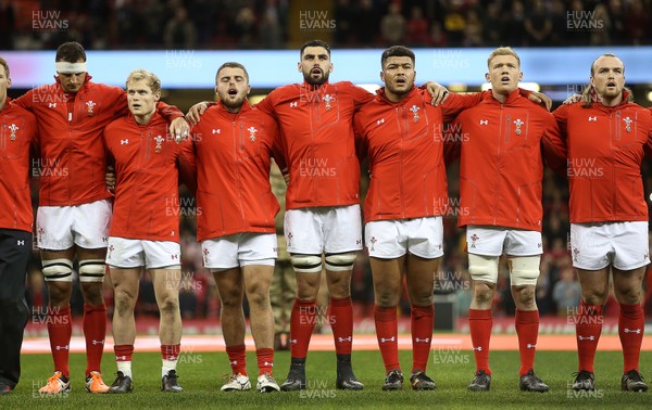 111117 - Wales v Australia - Under Armour Series 2017 - Aaron Shingler, Aled Davies, Nicky Smith, Cory Hill, Leon Brown, Sam Cross and Kristian Dacey of Wales sing the anthem