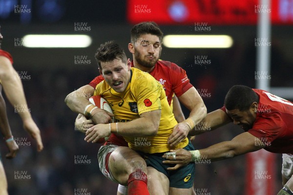 111117 Wales v Australia - Under Armour 2017 Series -  Bernard Foley of Australia is tackled by Owen Williams of Wales 