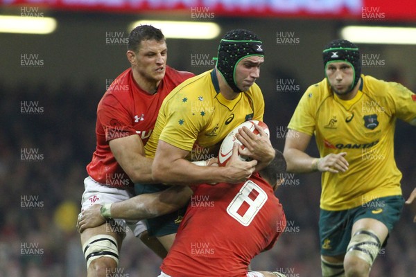 111117 Wales v Australia - Under Armour 2017 Series -  Rob Simmons of Australia is tackled by Aaron Shingler and Taulupe Faletau of Wales 
