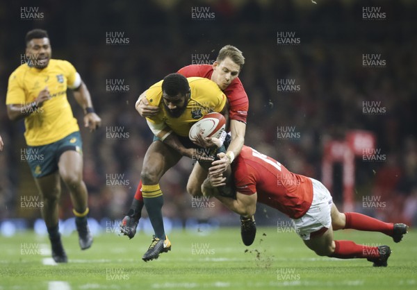 111117 - Wales v Australia, Under Armour Series 2017 - Marika Koroibete of Australia  is tackled by Leigh Halfpenny of Wales and Liam Williams of Wales