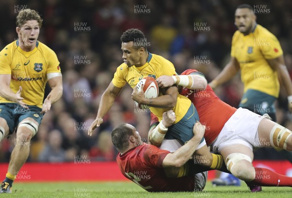 111117 - Wales v Australia, Under Armour Series 2017 - Will Genia of Australia is tackled by Ken Owens of Wales and Jake Ball of Wales