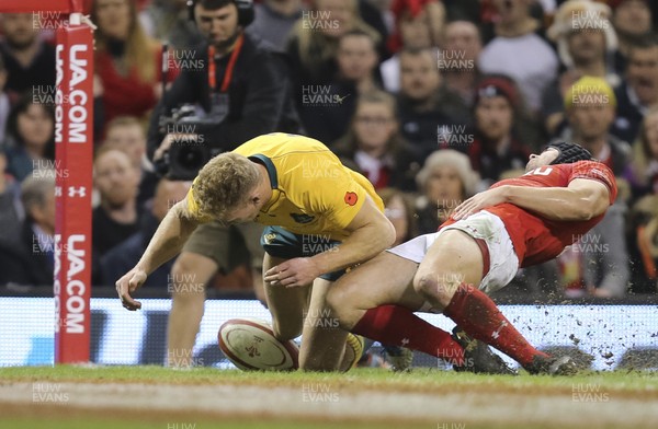 111117 - Wales v Australia, Under Armour Series 2017 - Leigh Halfpenny of Wales slides in to deny Reece Hodge of Australia a try