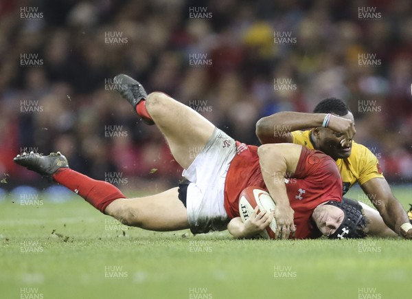 111117 - Wales v Australia, Under Armour Series 2017 - Leigh Halfpenny of Wales is tackled by Tevita Kuridrani of Australia
