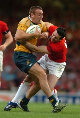 14.09.07 - Wales v Australia - Rugby World Cup 2007 -  Wales' Stephen Jones tackles Chris Latham 