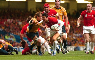 14.09.07 - Wales v Australia - Rugby World Cup 2007 -  Wales' James Hook takes on Rocky Elsom 