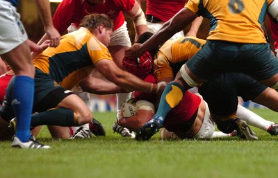 14.09.07 - Wales v Australia - Rugby World Cup 2007 -  Wales' Jonathan Thomas(red scrum cap) touches down to score try 