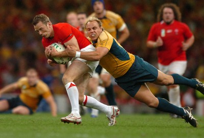 14.09.07 - Wales v Australia - Rugby World Cup 2007 -  Wales' Kevin Morgan is tackled by Phil Waugh 