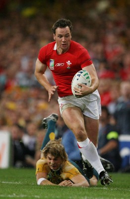 15.09.07  Wales v Australia... Australia's  Drew Mitchell can't get hold of Mark Jones. 