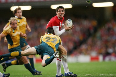 15.09.07  Wales v Australia... Australia's  Julian Huxley gets hold of James Hook.  