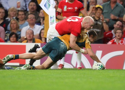 15.09.07 -Wales v Australia, RWC 2007 -  Australia's Chris Latham beats Tom Shanklin to score try 