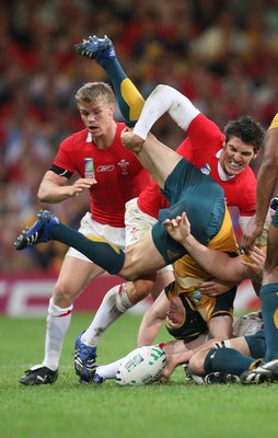 15.09.07 -Wales v Australia, RWC 2007 -  Wales' James Hook upends Matt Giteau 