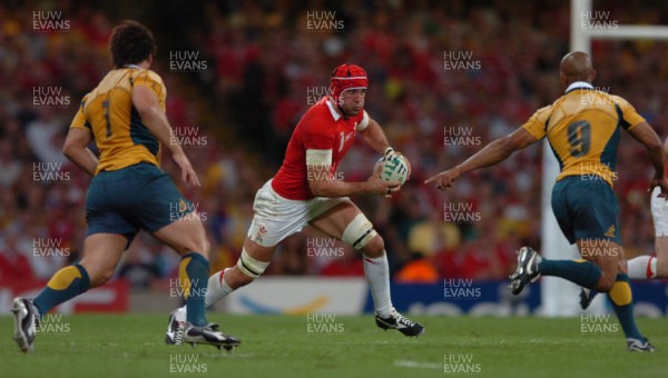 14.09.07 - Wales v Australia - Rugby World Cup 2007 -  Wales' Jonathan Thomas takes on George Gregan 