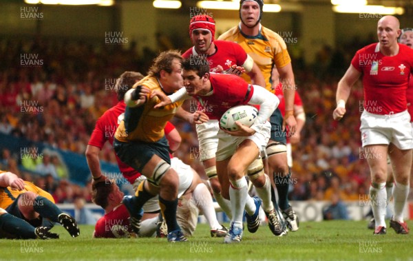 14.09.07 - Wales v Australia - Rugby World Cup 2007 -  Wales' James Hook takes on Rocky Elsom 