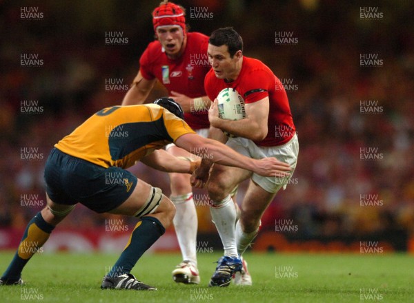 14.09.07 - Wales v Australia - Rugby World Cup 2007 -  Wales' Stephen Jones is tackled by Daniel Vickerman 