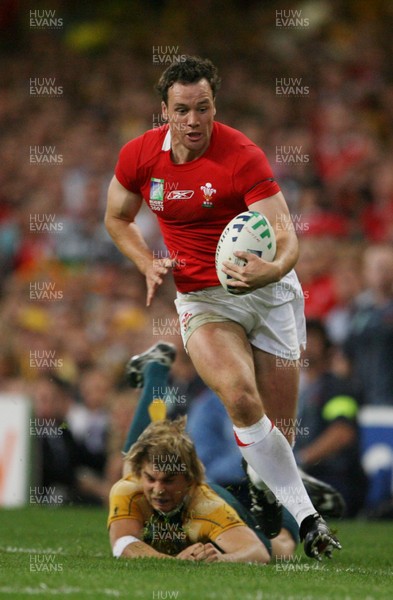 15.09.07  Wales v Australia... Australia's  Drew Mitchell can't get hold of Mark Jones. 