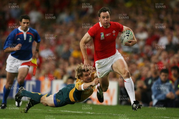 15.09.07  Wales v Australia... Australia's  Drew Mitchell can't get hold of Mark Jones. 