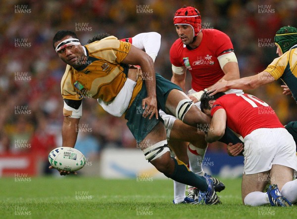 15.09.07  Wales v Australia... Australia's  Wycliff Palu is tackled by James Hook. 