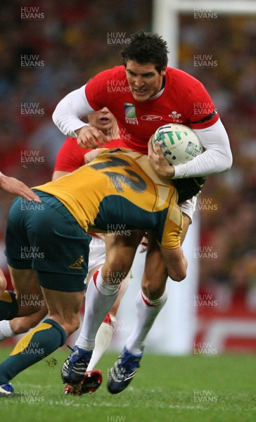 15.09.07  Wales v Australia... Wales James Hook is tackled by Matt Giteau. 